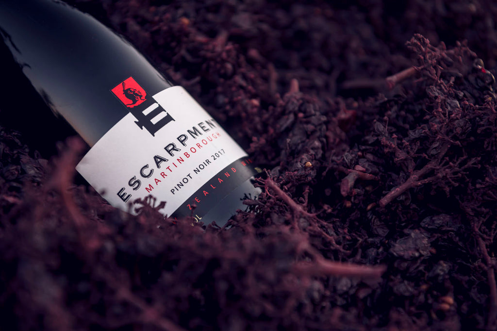 The Escarpment Pinot Noir lying in grape marc